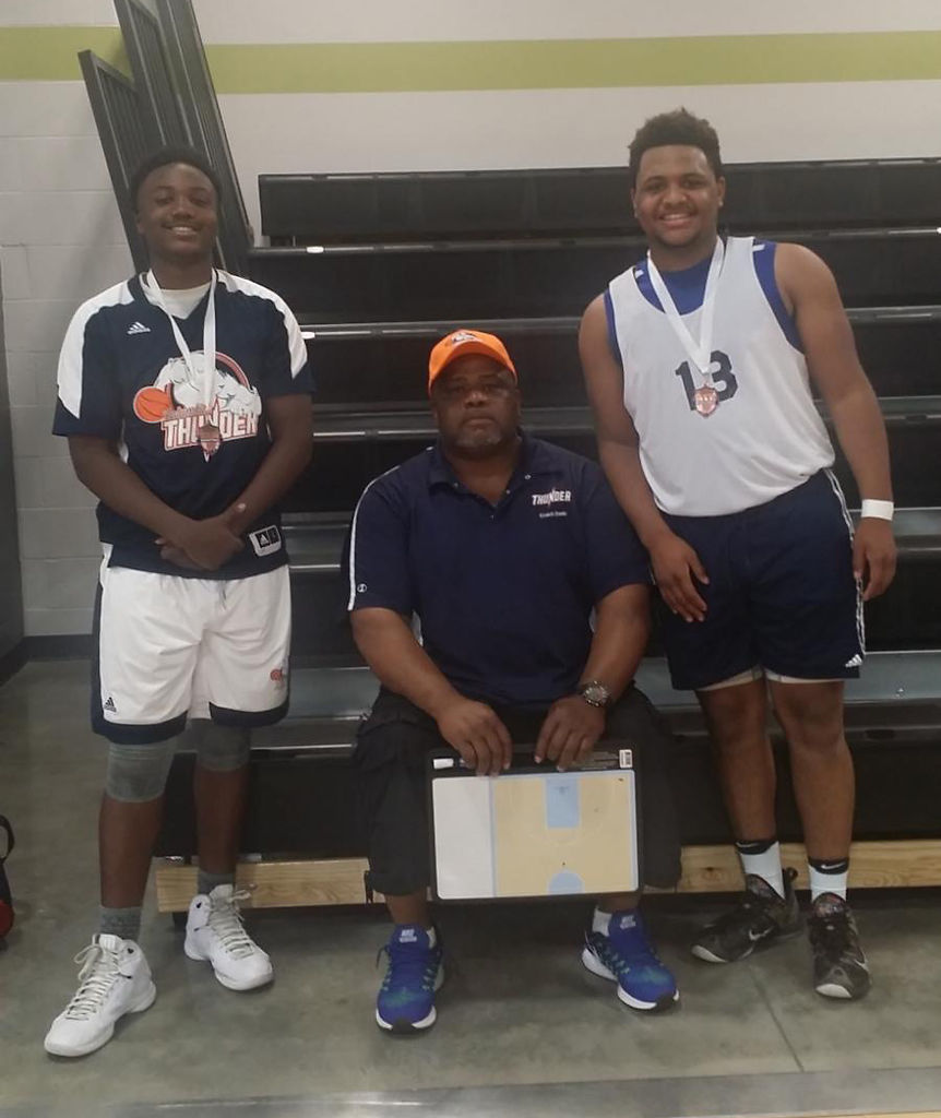 Will Henderson, Marlin Dade, Kaleo’s dad and Will’s stepdad, and Kaleo Dade pose for a photo together